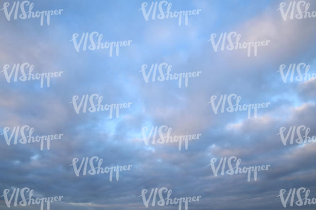 blue sky with thin stratus clouds