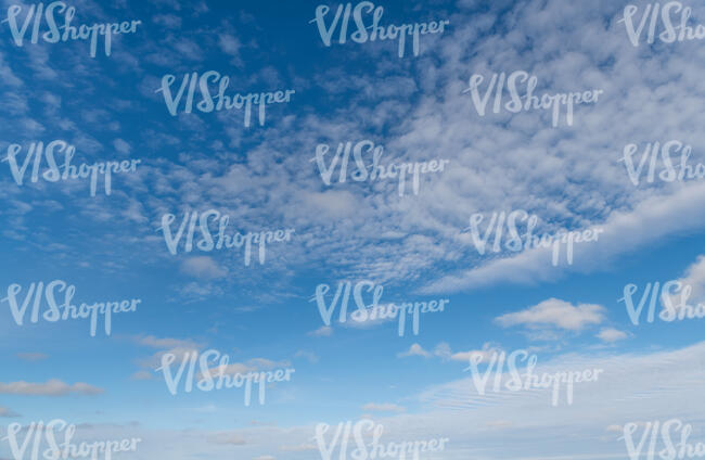 blue sky with thin clouds