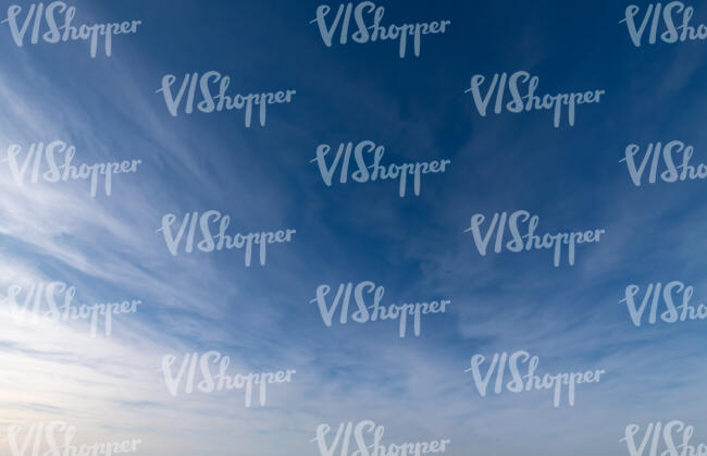 blue sky with thin cirrus clouds