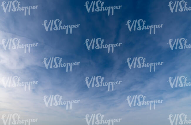 daytime sky with thin cover of clouds