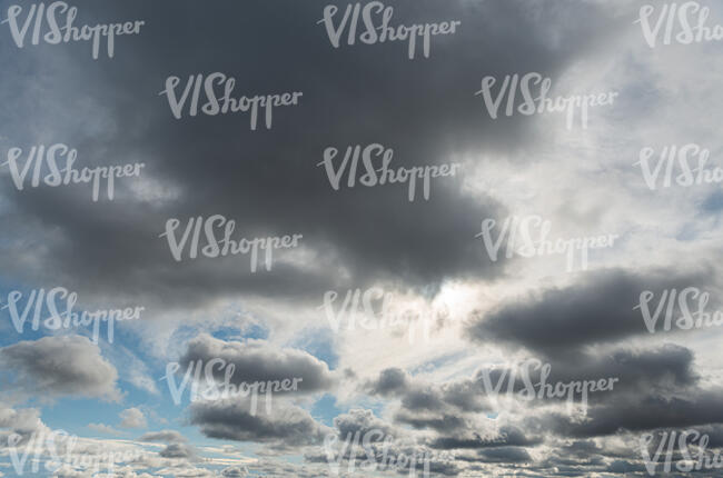 daytime sky with grey and white clouds