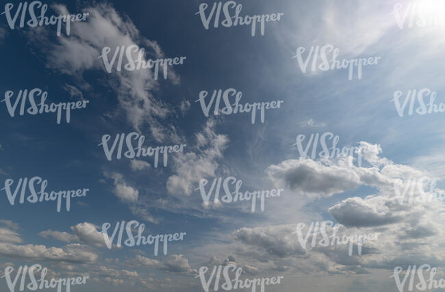 deep blue daytime sky with clouds