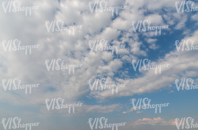 sky mostly covered with white clouds