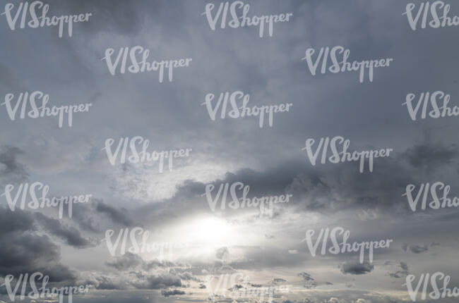 sky covered with thin grey clouds