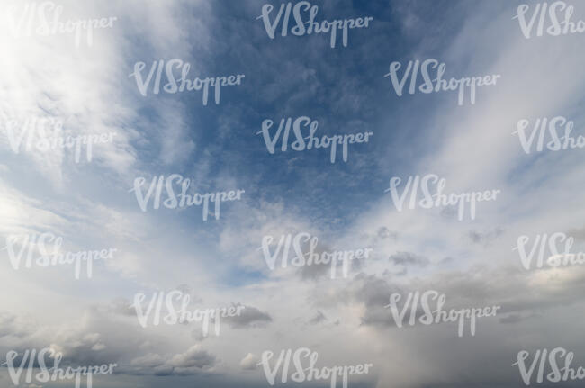 cloudy sky with a patch of blue sky