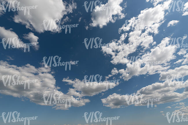 daytime sky with some white clouds