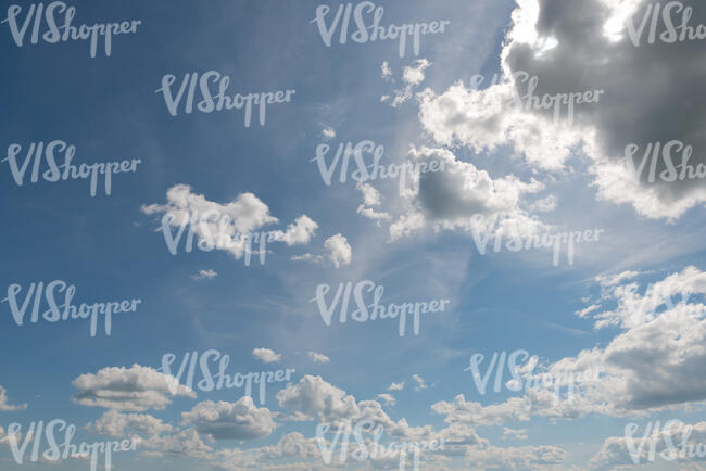 daytime sky with backlit white clouds