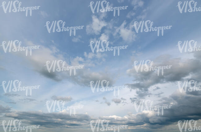 daytime sky with light grey clouds