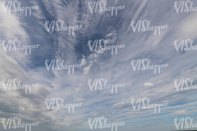 sky covered with thin clouds