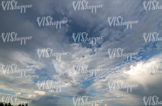 cloudy sky with large white clouds