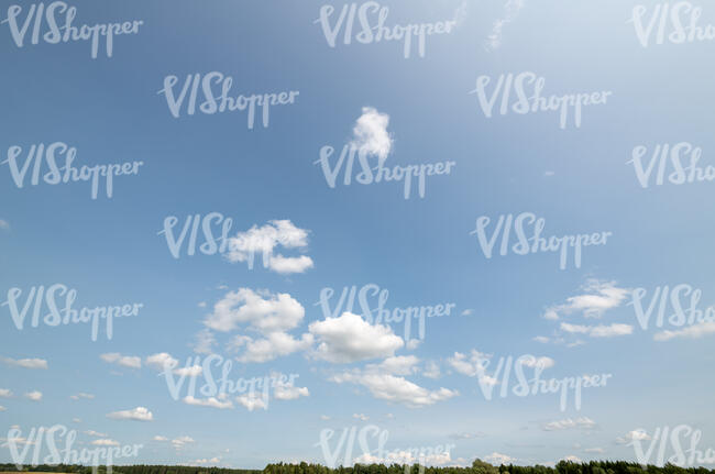 blue sky with few small clouds