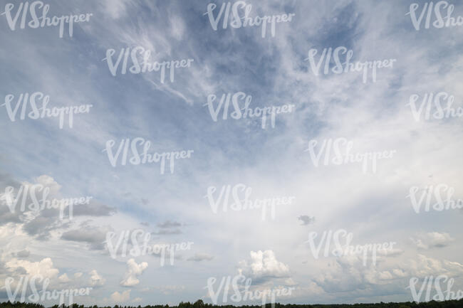 daytime sky thinly covered with clouds