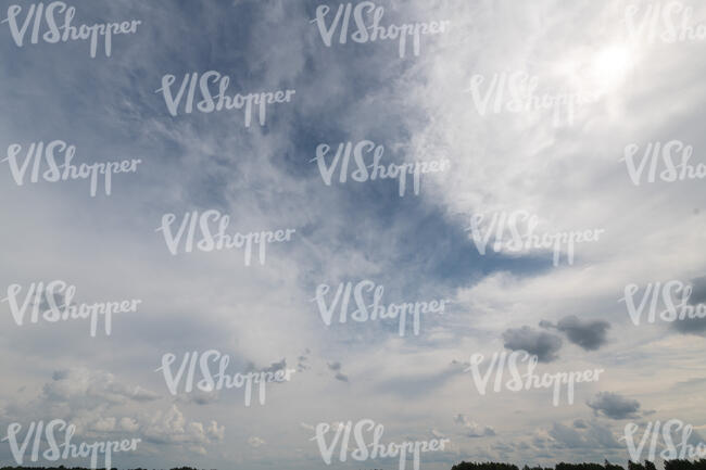 sky covered with thin clouds