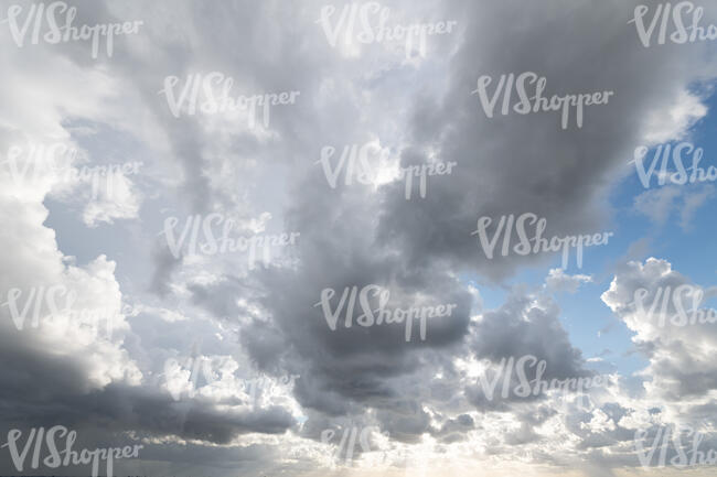 daytime sky covered with many big clouds