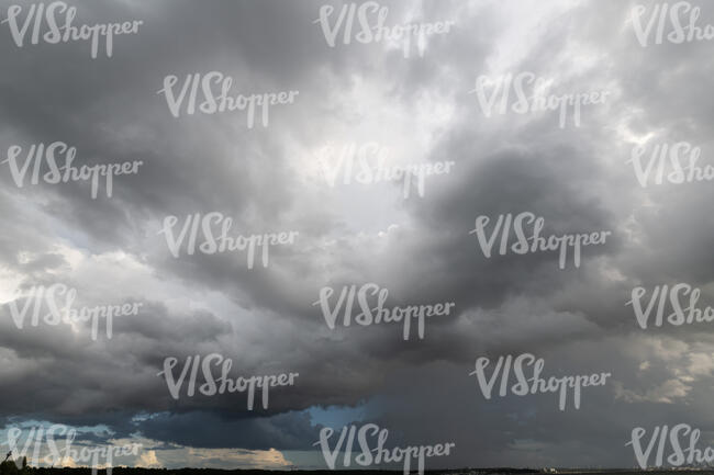 daytime sky with thunder clouds