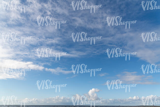 daytime sky with small regular clouds