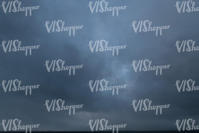 sky covered with dark blue clouds